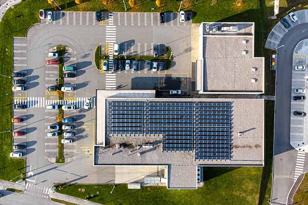 Solar panels for businesses Manchester on retail building
